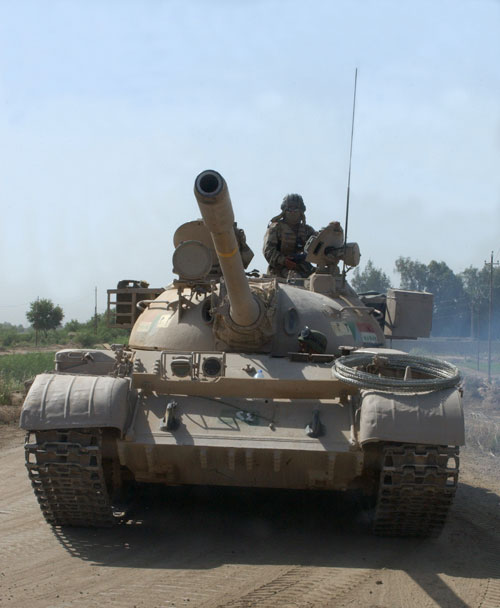 T55 of 1st Iraqi Mechanized Brigade Conducting a route security patrol